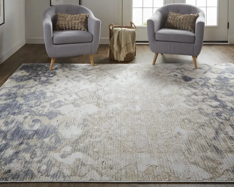 5' X 8' Tan Ivory And Blue Abstract Power Loom Distressed Area Rug