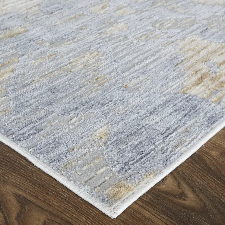 10' X 13' Tan Ivory And Blue Abstract Power Loom Distressed Area Rug