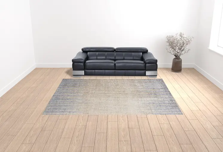 10' X 13' Tan Brown And Blue Abstract Power Loom Distressed Area Rug