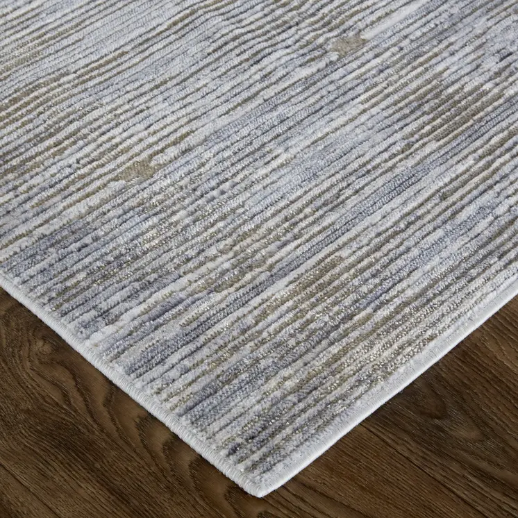 2' X 3' Taupe Silver And Tan Abstract Power Loom Area Rug