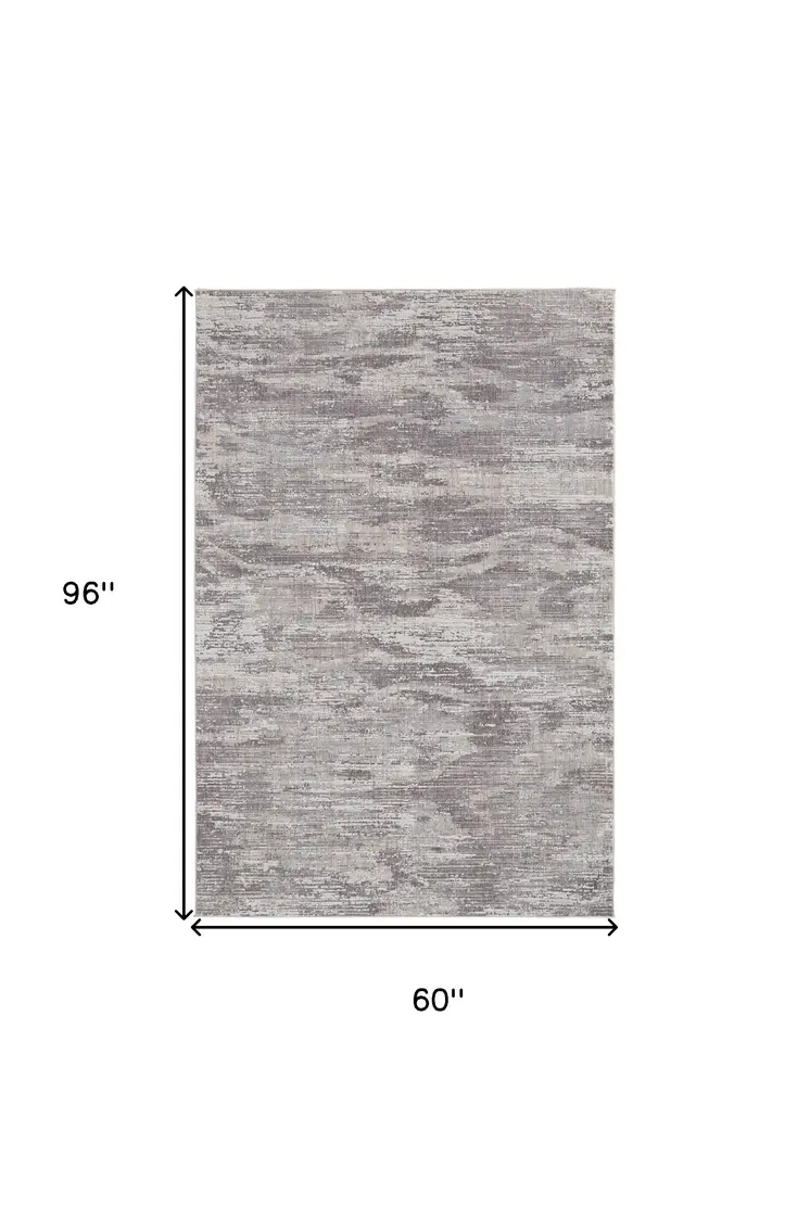 5' X 8' Tan and Gray Abstract Power Loom Distressed Area Rug