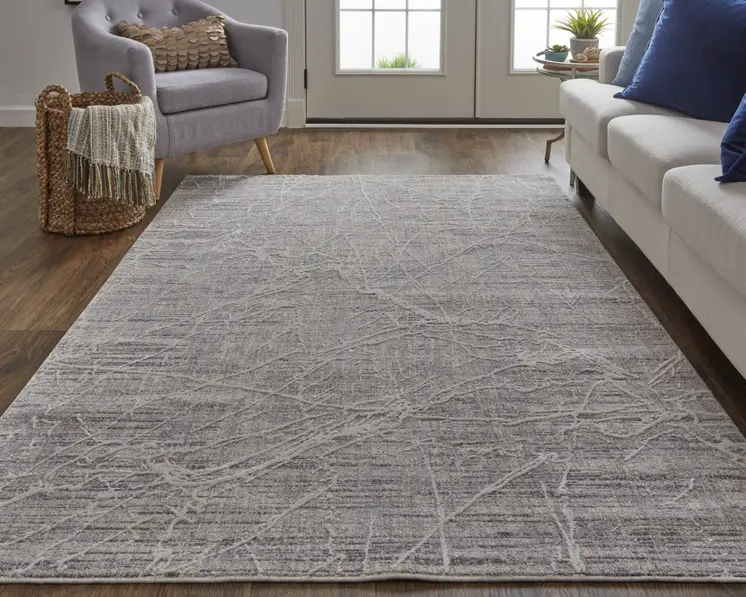 2' X 3' Taupe And Gray Abstract Power Loom Distressed Stain Resistant Area Rug