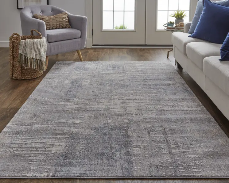 8' X 10' Tan and Blue Abstract Power Loom Distressed Area Rug