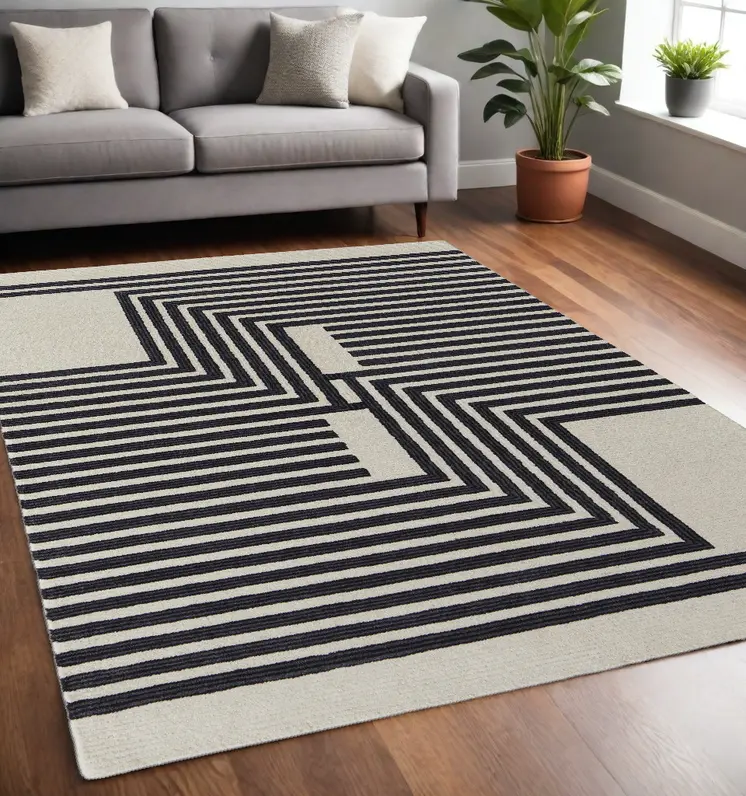 5' X 8' Black and Ivory Abstract Geometric Hand Tufted Area Rug