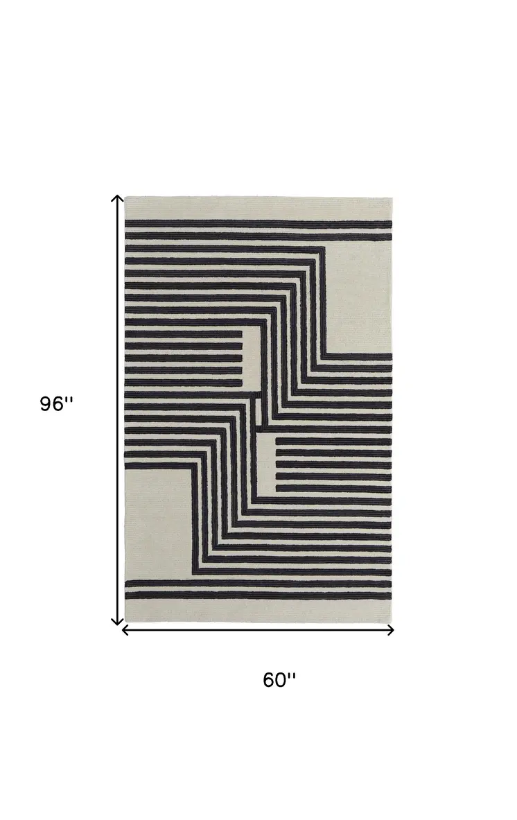 5' X 8' Black and Ivory Abstract Geometric Hand Tufted Area Rug