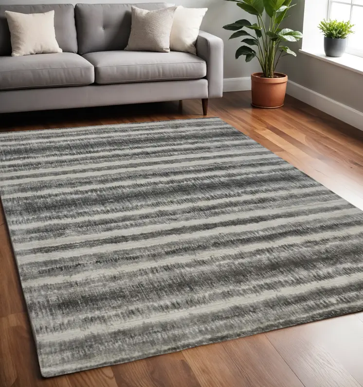 5' X 8' Gray and Black Abstract Hand Woven Area Rug