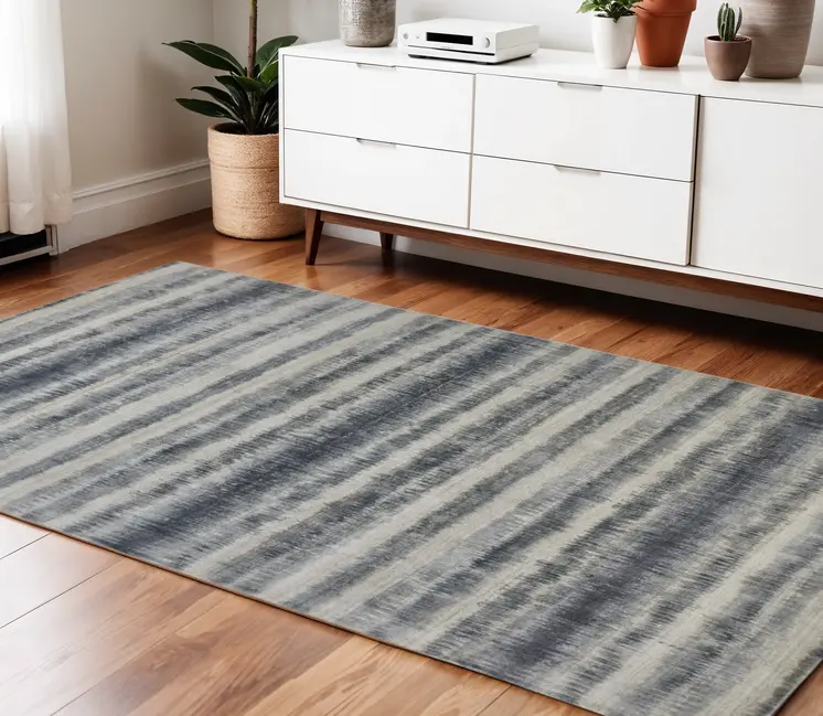 4' X 6' Ivory And Blue Abstract Hand Woven Area Rug
