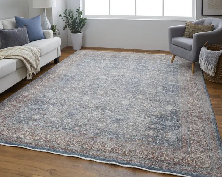 5' X 7' Blue and Beige Floral Power Loom Area Rug