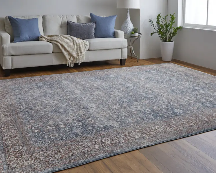 5' X 7' Blue and Beige Floral Power Loom Area Rug