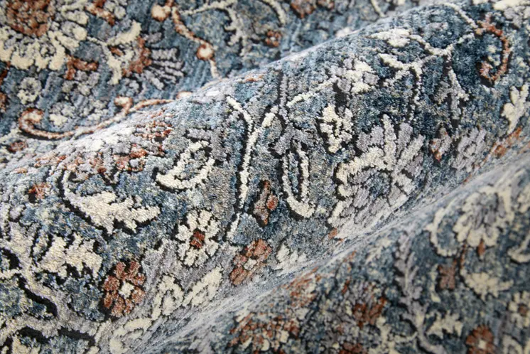 5' X 7' Blue and Beige Floral Power Loom Area Rug