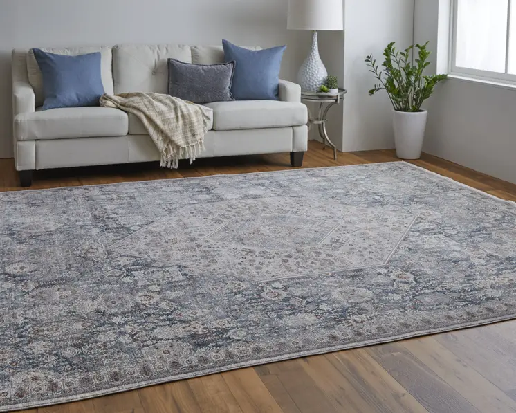 5' X 7' Blue and Ivory Floral Power Loom Area Rug