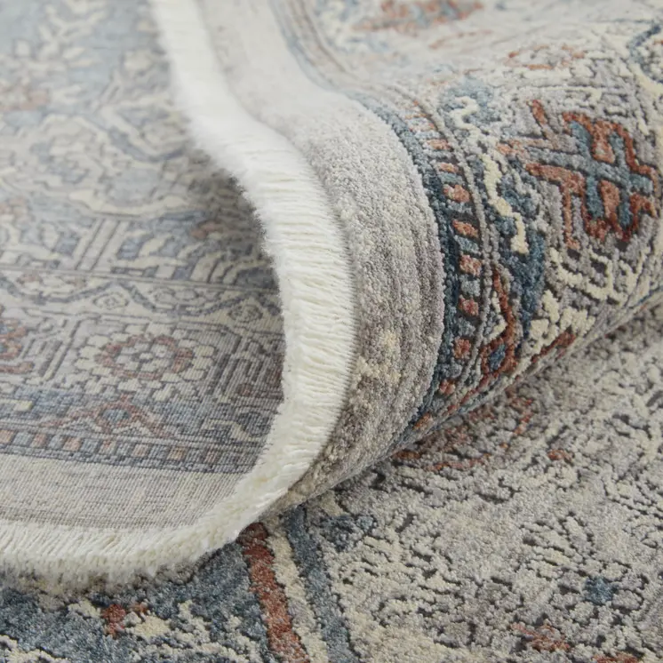 5' X 7' Blue and Ivory Floral Power Loom Area Rug