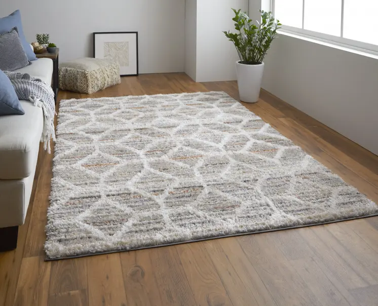 9' X 12' Tan Taupe And Ivory Geometric Power Loom Stain Resistant Area Rug