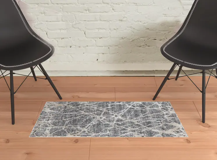2' X 3' Gray And Ivory Abstract Power Loom Stain Resistant Area Rug