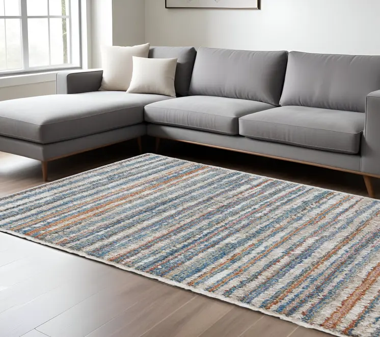 8' X 10' Ivory and Blue Striped Power Loom Area Rug