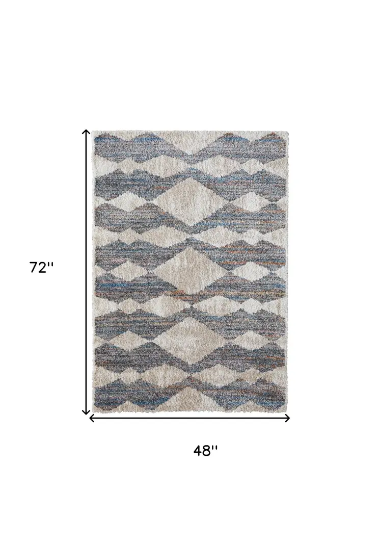 4' X 6' Tan Ivory And Blue Chevron Power Loom Stain Resistant Area Rug