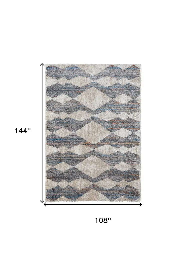 9' X 12' Tan Ivory And Blue Chevron Power Loom Stain Resistant Area Rug
