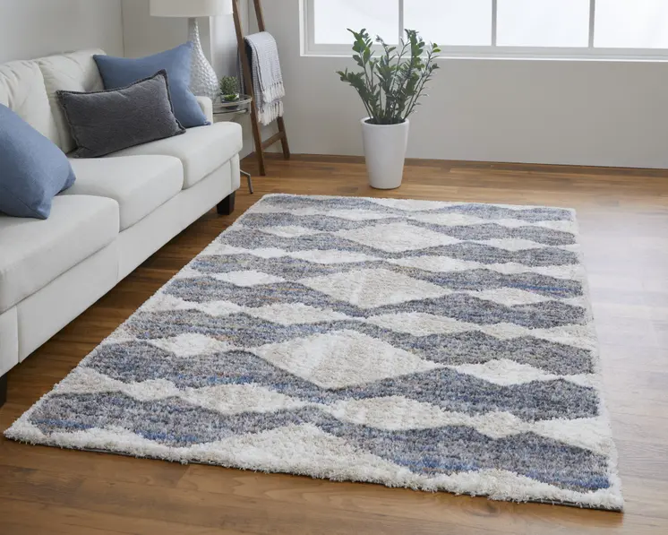 10' X 14' Tan Ivory And Blue Chevron Power Loom Stain Resistant Area Rug