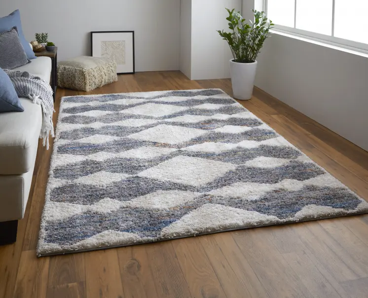 10' X 14' Tan Ivory And Blue Chevron Power Loom Stain Resistant Area Rug