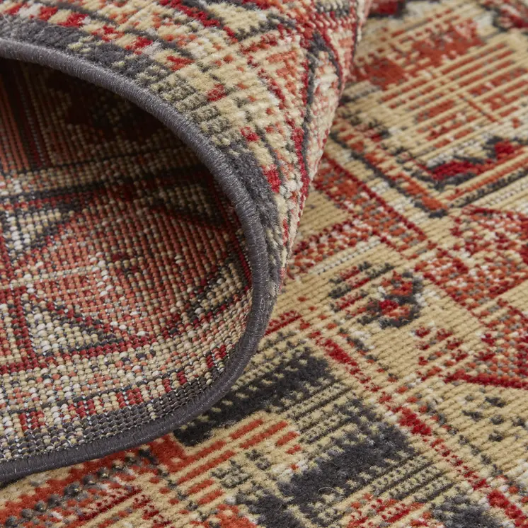 10' X 13' Red Tan And Black Abstract Power Loom Distressed Stain Resistant Area Rug