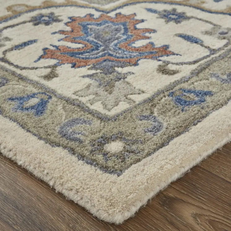 5' X 8' Ivory and Blue Wool Floral Hand Tufted Area Rug