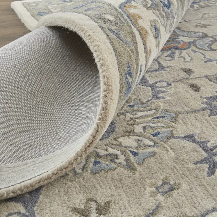 5' X 8' Ivory and Blue Wool Floral Hand Tufted Area Rug