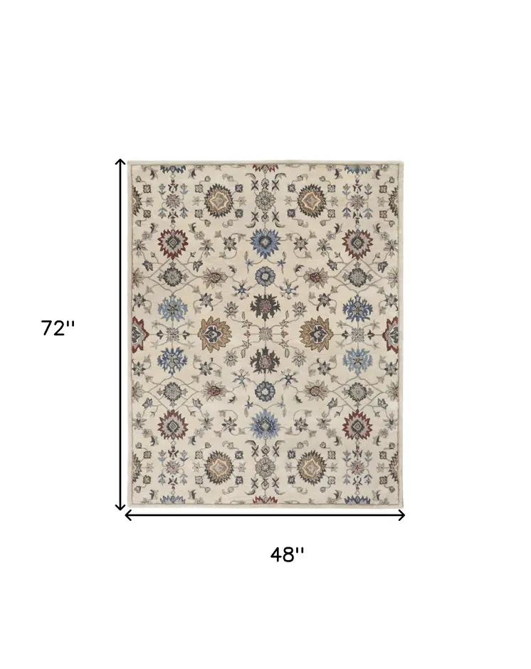 4' X 6' Ivory and Blue Wool Floral Hand Tufted Area Rug