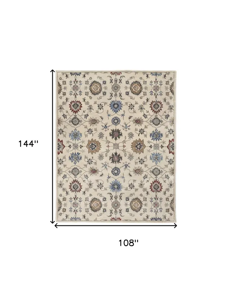 9' X 12' Ivory and Blue Wool Floral Hand Tufted Area Rug