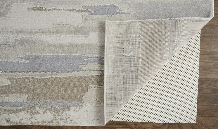 5' X 8' Brown and Ivory Abstract Power Loom Distressed Area Rug