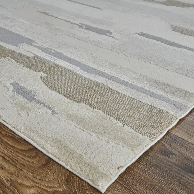 7' X 10' Ivory and Gray Abstract Power Loom Distressed Area Rug