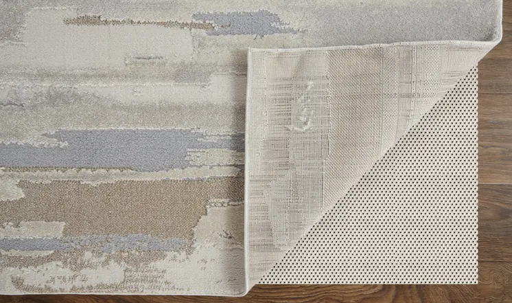 7' X 10' Ivory and Gray Abstract Power Loom Distressed Area Rug