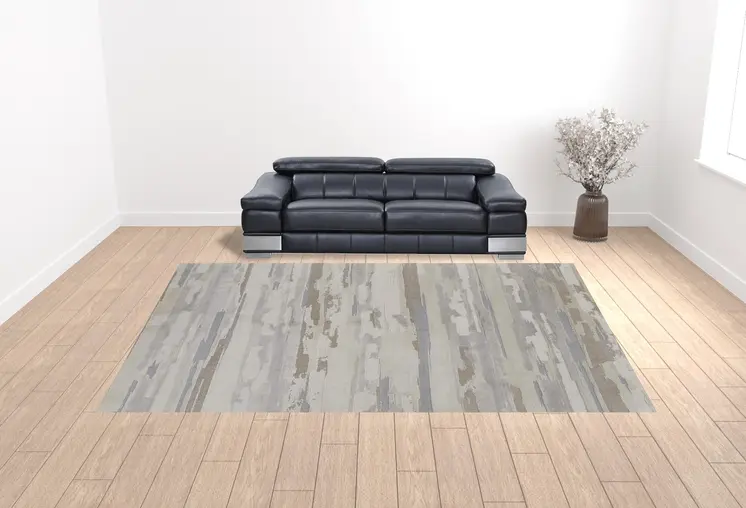 12' X 15' Ivory Tan And Brown Abstract Power Loom Distressed Stain Resistant Area Rug