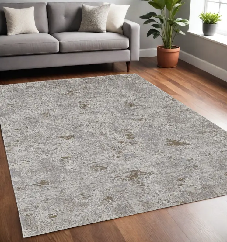 5' X 8' Gray and Ivory Abstract Power Loom Distressed Area Rug