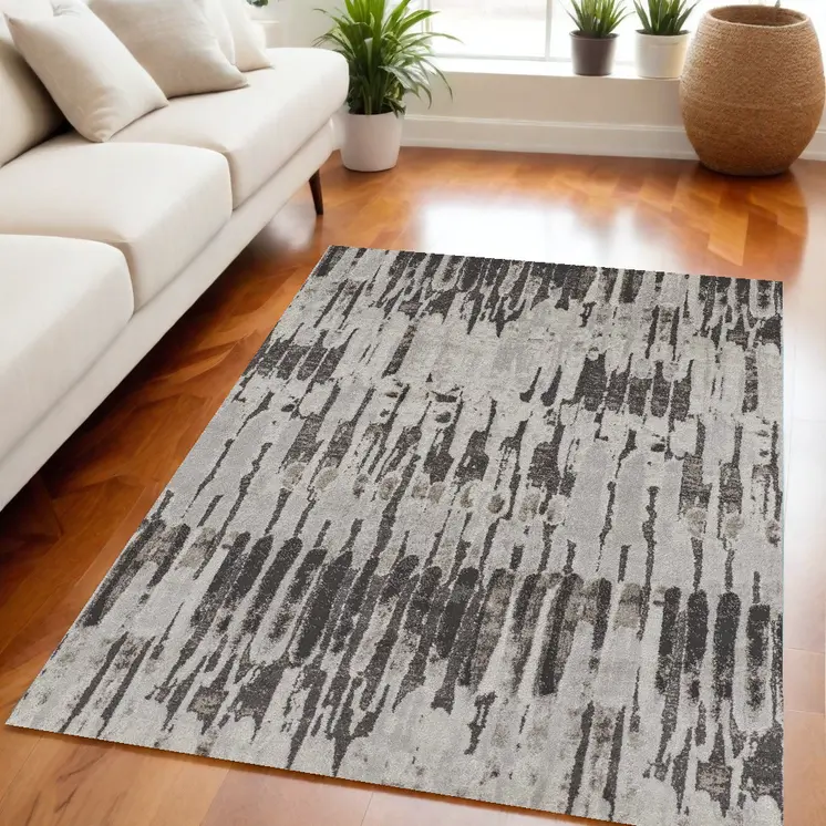 5' X 8' Gray and Ivory Abstract Power Loom Area Rug