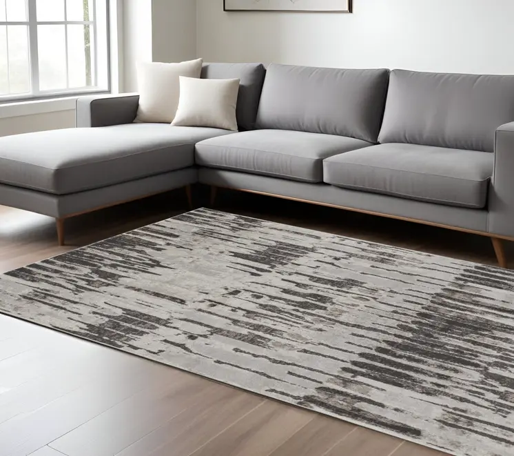 12' X 15' Ivory Brown And Gray Abstract Power Loom Stain Resistant Area Rug