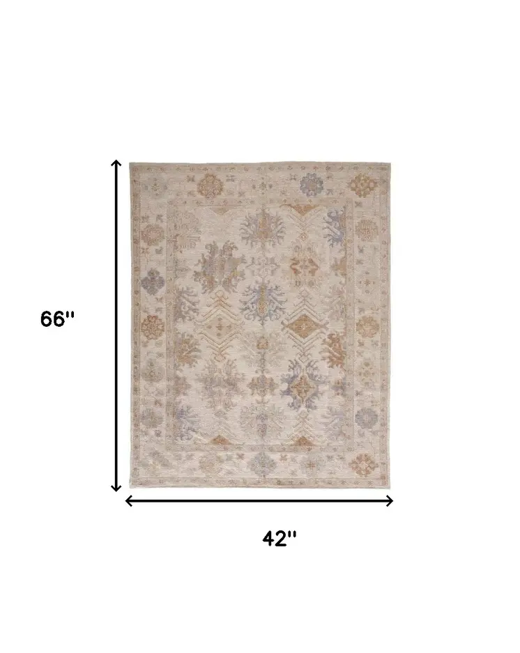 4' X 6' Beige and Brown Floral Hand Knotted Area Rug