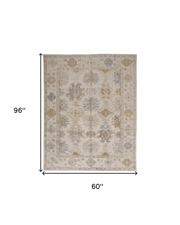 5' X 8' Ivory and Blue Floral Hand Knotted Area Rug