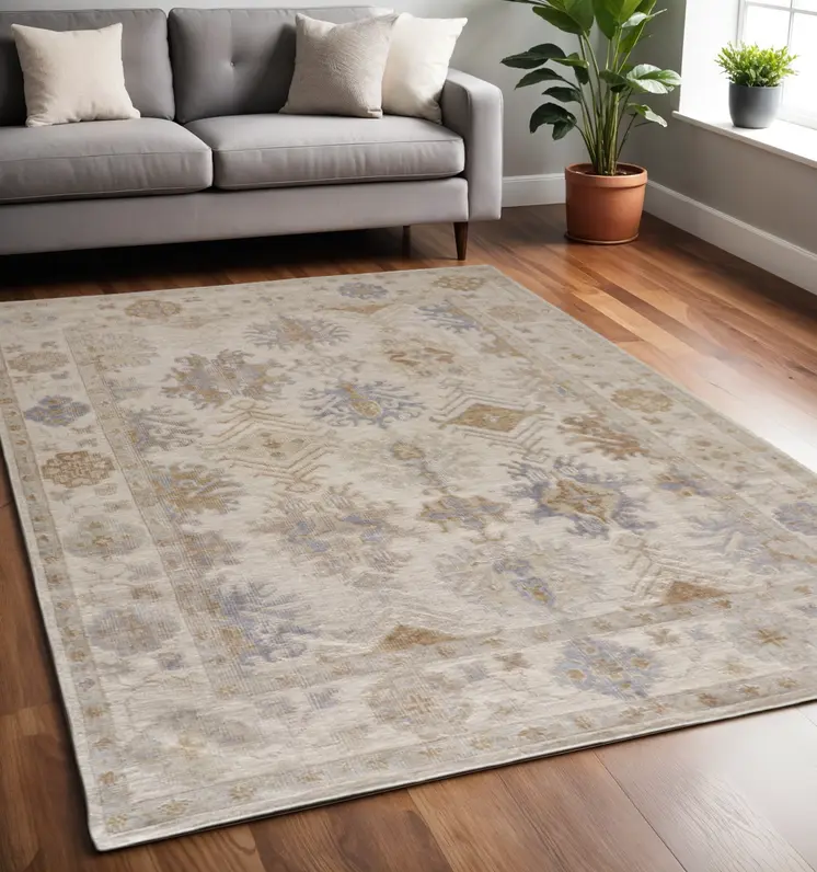 5' X 8' Ivory and Blue Floral Hand Knotted Area Rug