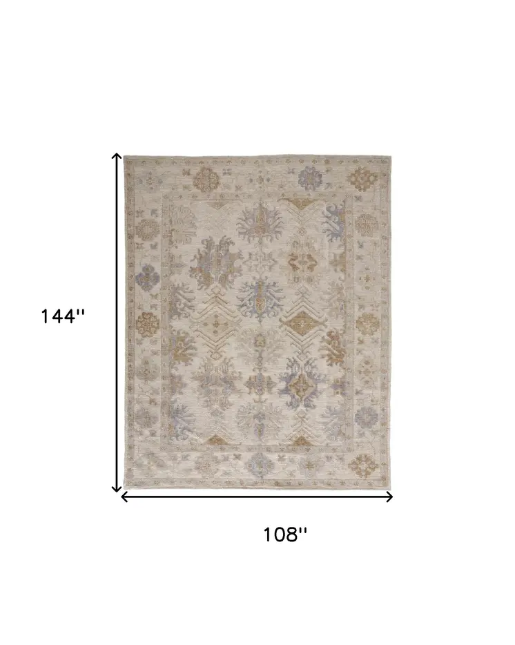 9' X 12' Ivory Tan And Blue Floral Hand Knotted Stain Resistant Area Rug