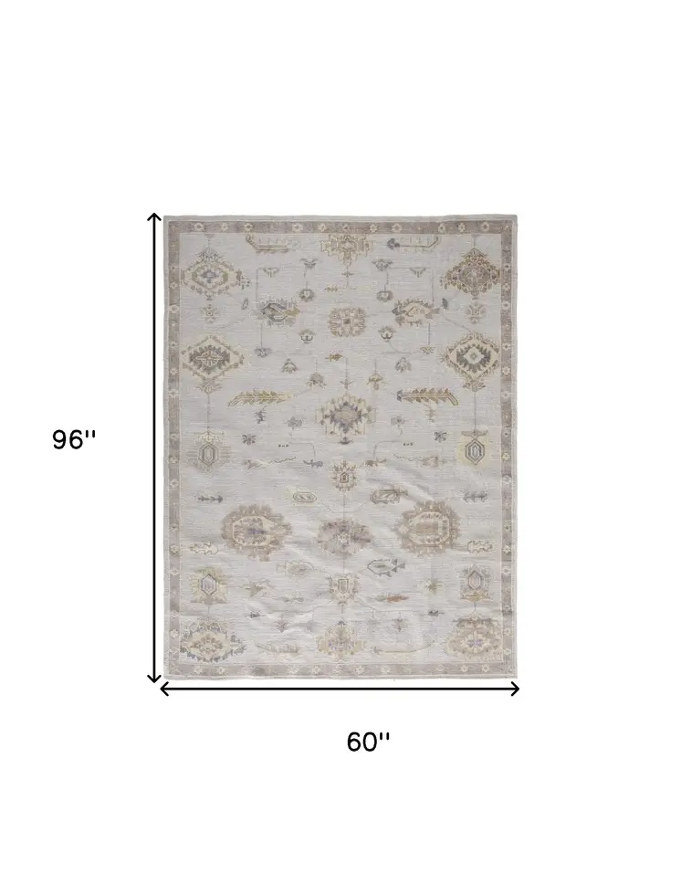 5' X 8' Orange and Ivory Floral Hand Knotted Area Rug