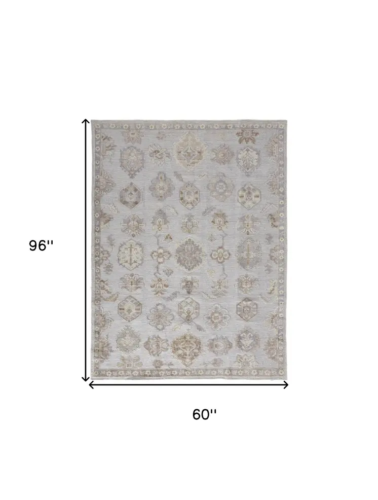 5' X 8' Gray and Ivory Floral Hand Knotted Area Rug