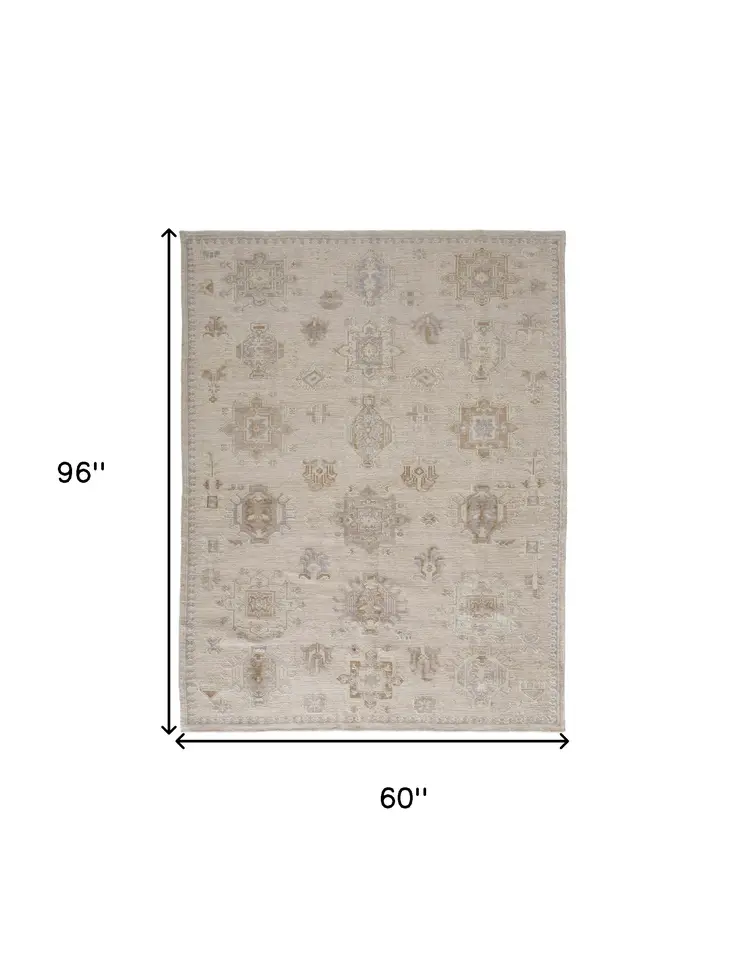 5' X 8' Tan And Brown Floral Hand Knotted Stain Resistant Area Rug