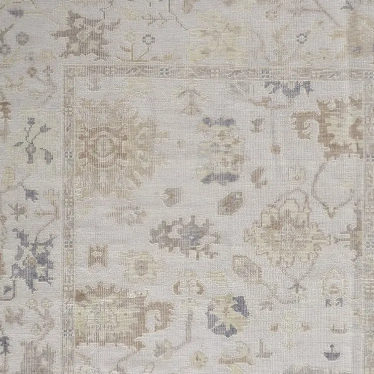 8' X 10' Tan Ivory And Orange Floral Hand Knotted Stain Resistant Area Rug