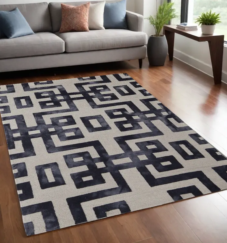 5' X 8' Ivory And Black Wool Tufted Handmade Area Rug