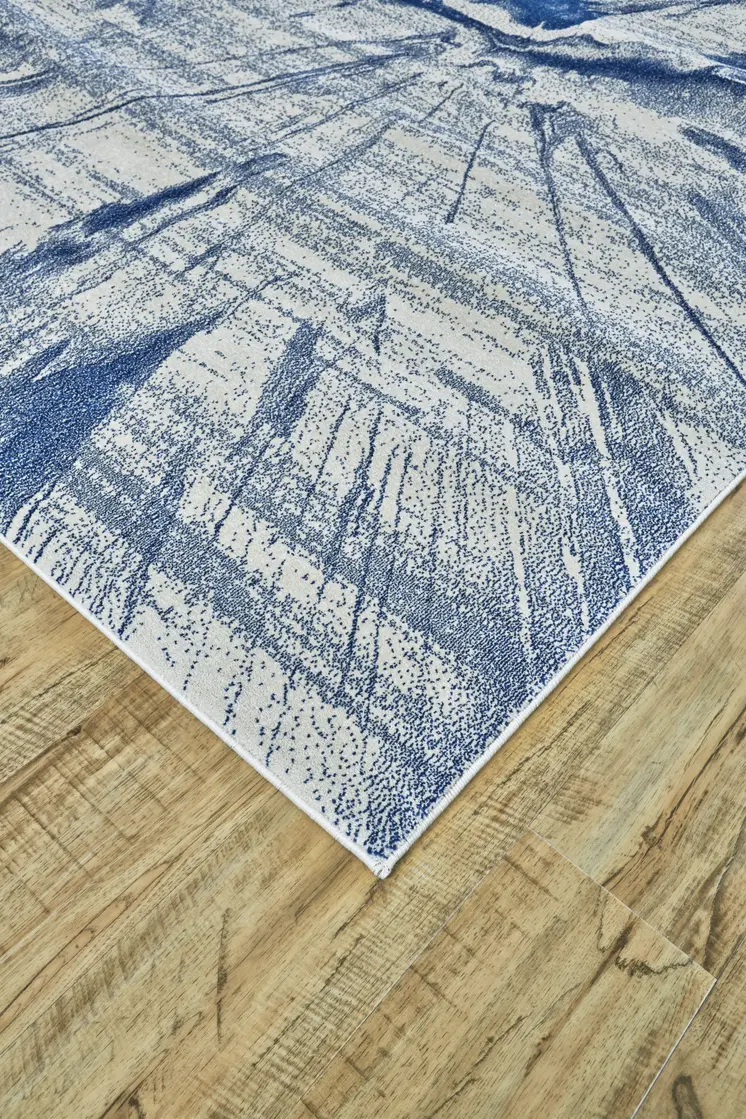 7' X 10' Blue And Ivory Stain Resistant Area Rug