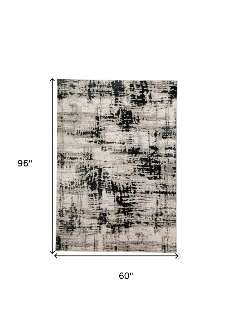 5' X 8' Black White And Gray Stain Resistant Area Rug