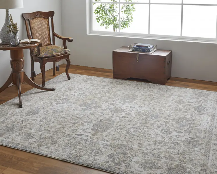 8' X 10' Ivory Tan And Gray Power Loom Area Rug