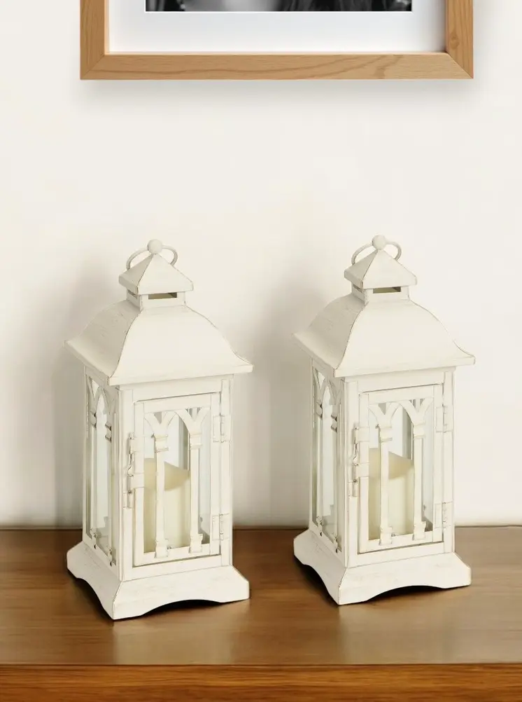 Set of Two Ivory Distressed Ornate Metal And Glass Tabletop Lantern Candle Holders With Candle