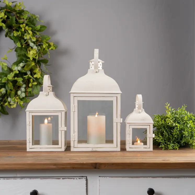 Set of Three Ivory Distressed Glass And Metal Floor Lantern Candle Holders
