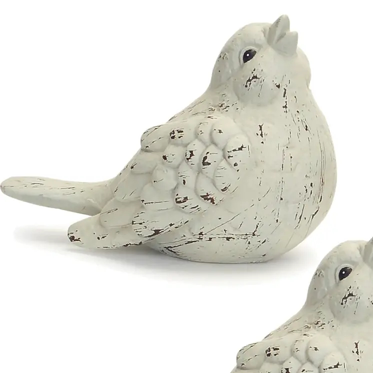 Set of Four Ivory Ceramic Bird Figurines